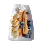 Cinnamon-sugar churros with caramel and fresh fruit for Colorado event catering
