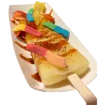 Paleta topped with chamoy and gummies for Denver event catering