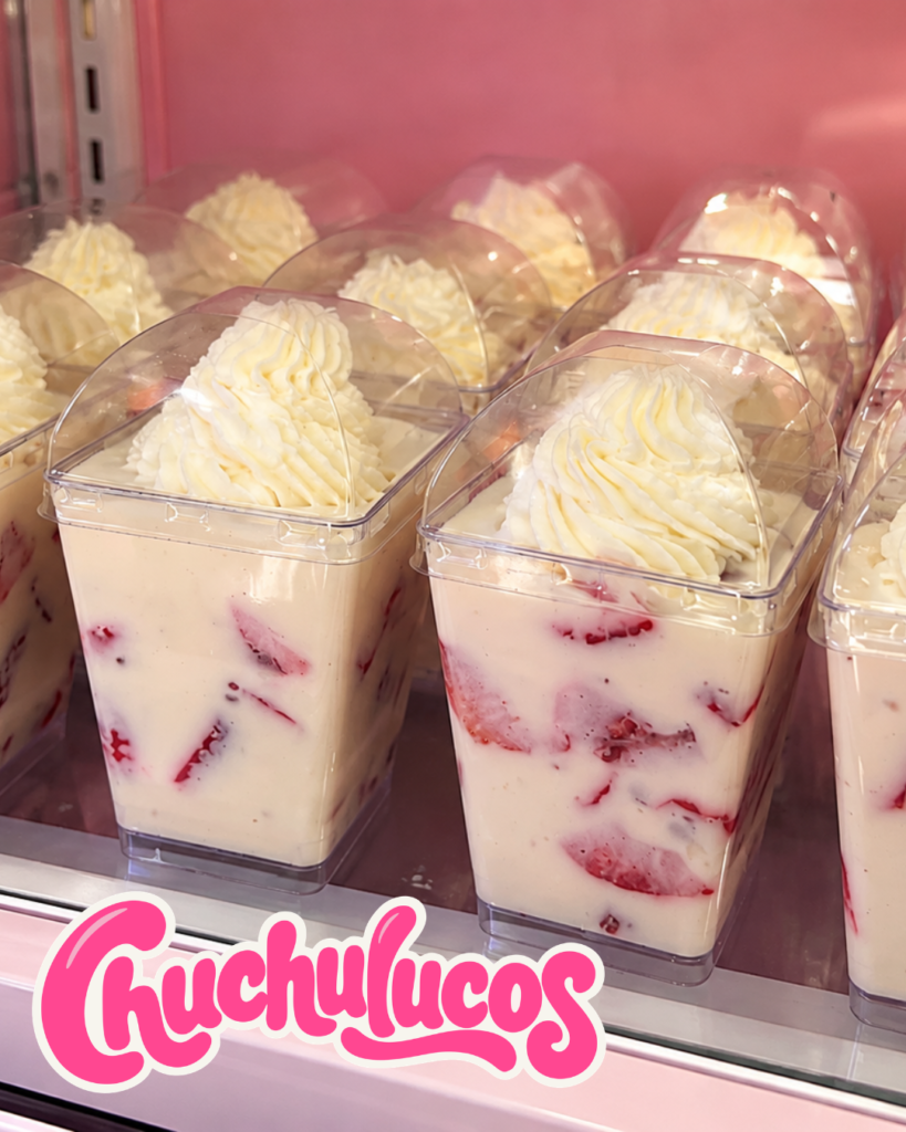 Fresas con crema cups topped with whipped cream