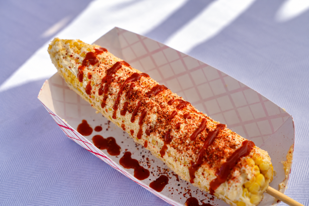 Elote on the cob with chile and crema